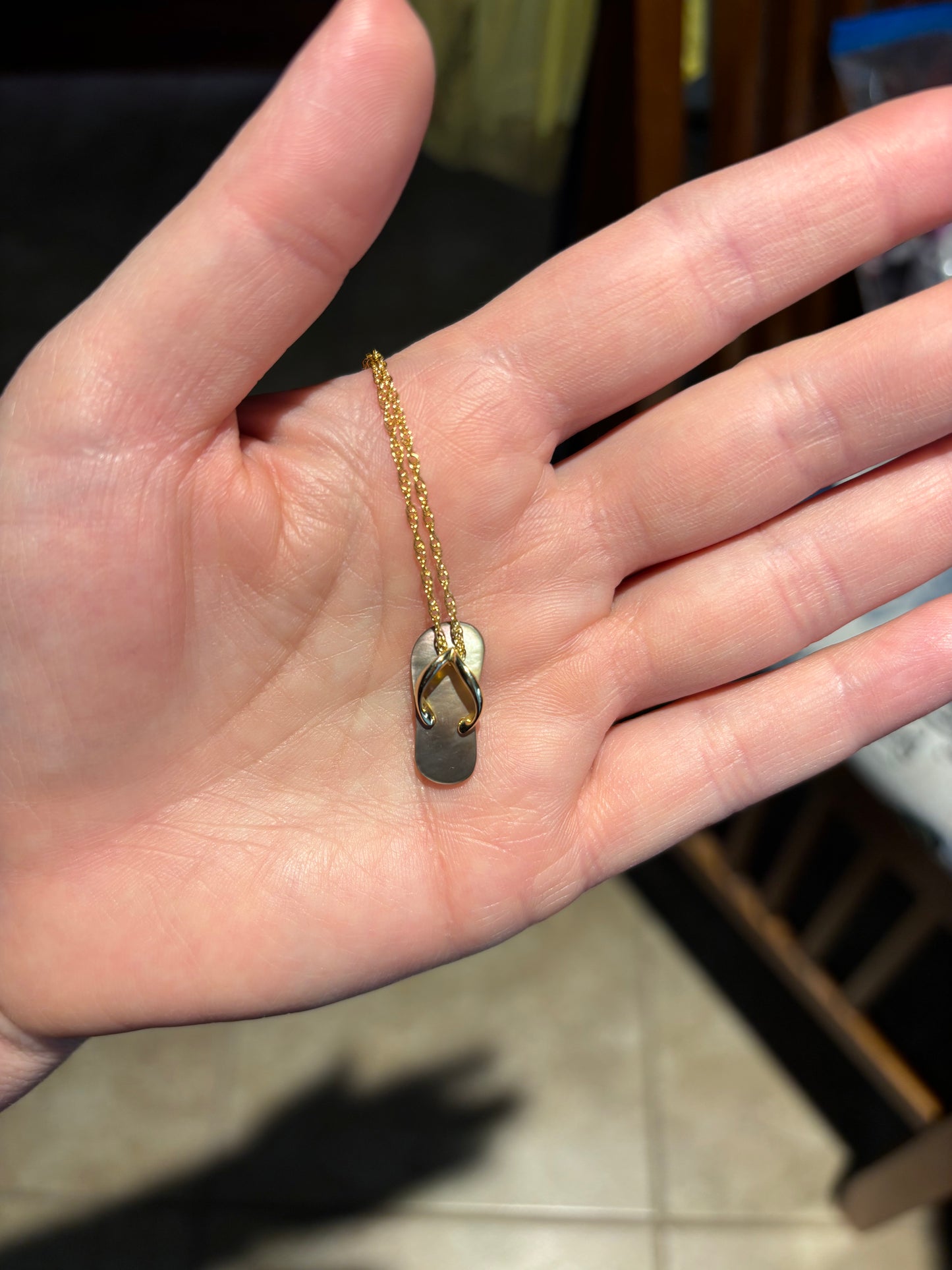 10k yellow gold 18” rope chain with gold & mother of pearl sandal pendant