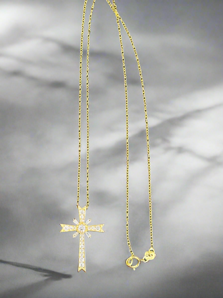 14k gold plating over sterling silver cross with white sapphires