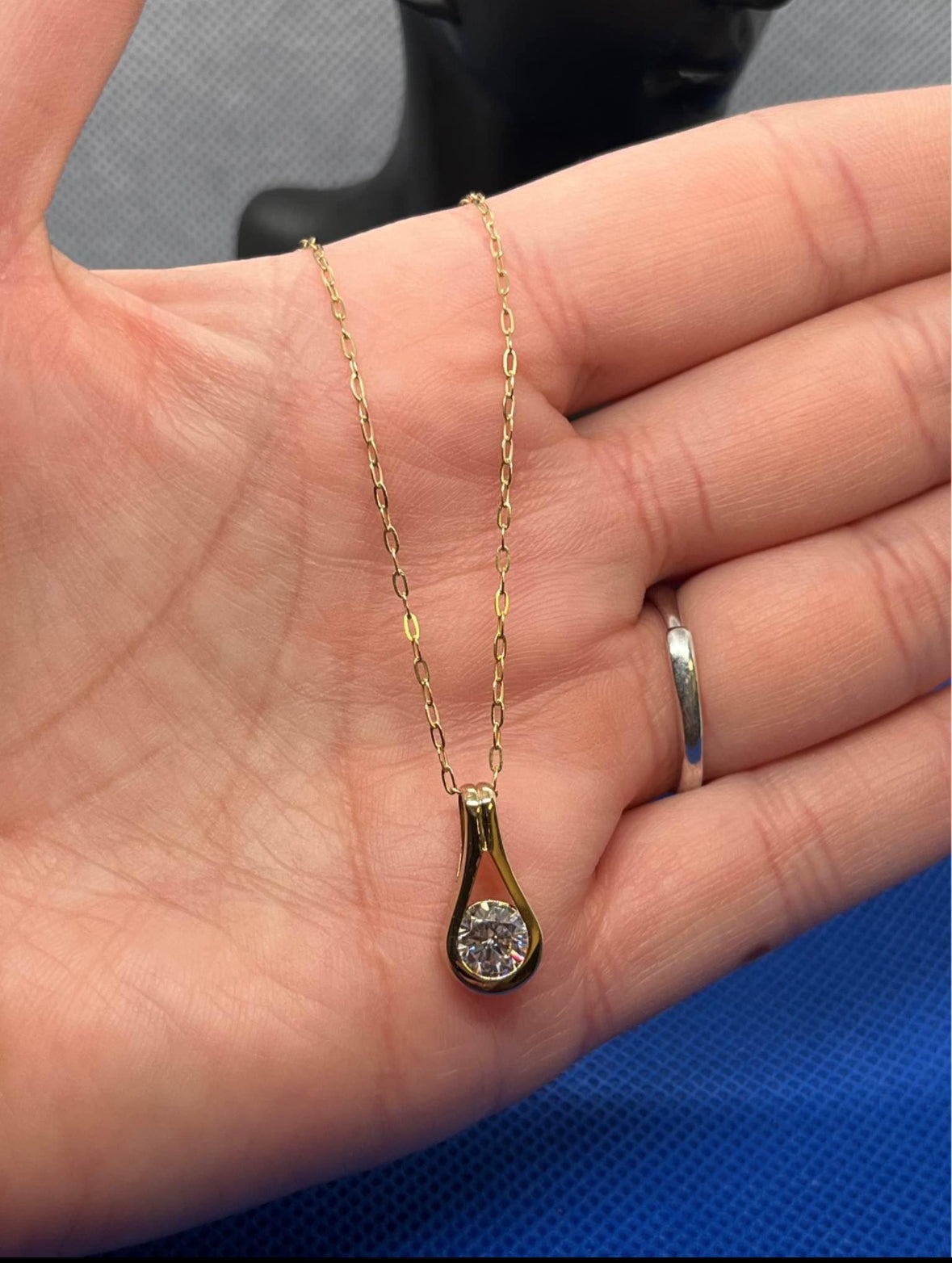 9k yellow gold & zirconia pendant & necklace, 18” long chain. 1.6g total gold weight