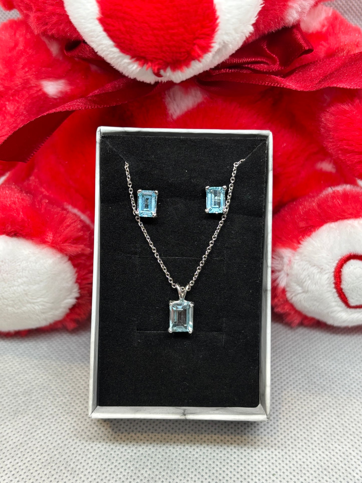 Sterling silver necklace & earring sets.