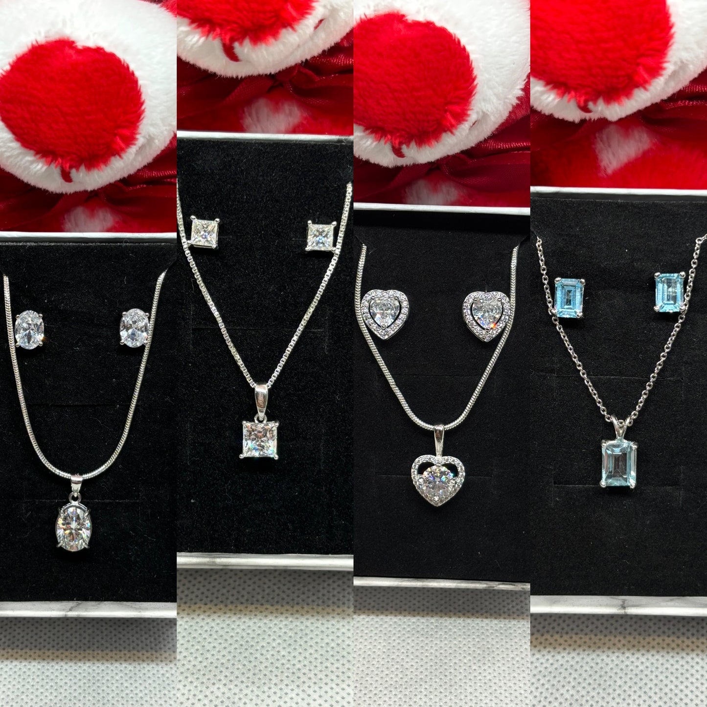 Sterling silver necklace & earring sets.