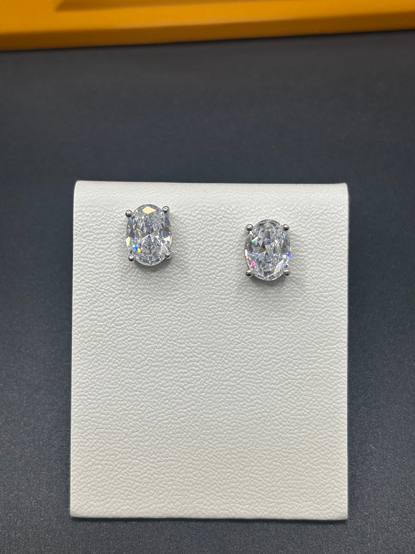 Oval cubic zirconia in sterling silver stud earrings