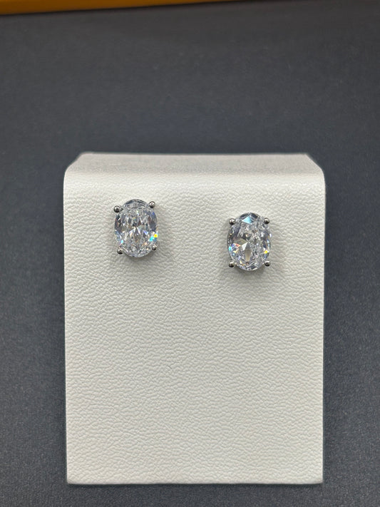 Oval cubic zirconia in sterling silver stud earrings