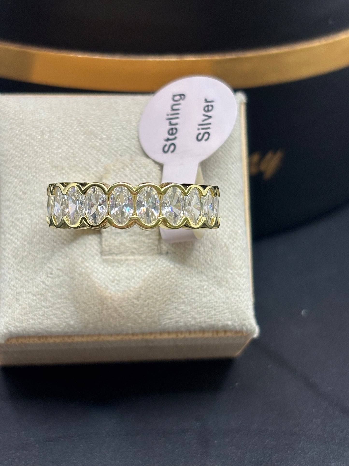 Pretty gold over sterling silver oval eternity band, size 8