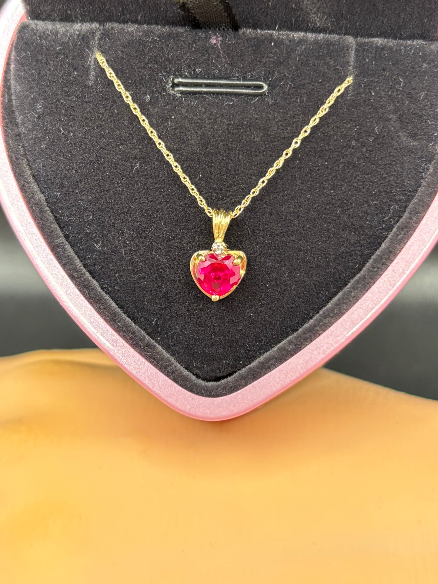 18” 10k yellow gold chain & heart pendant with diamond accent & synthetic ruby