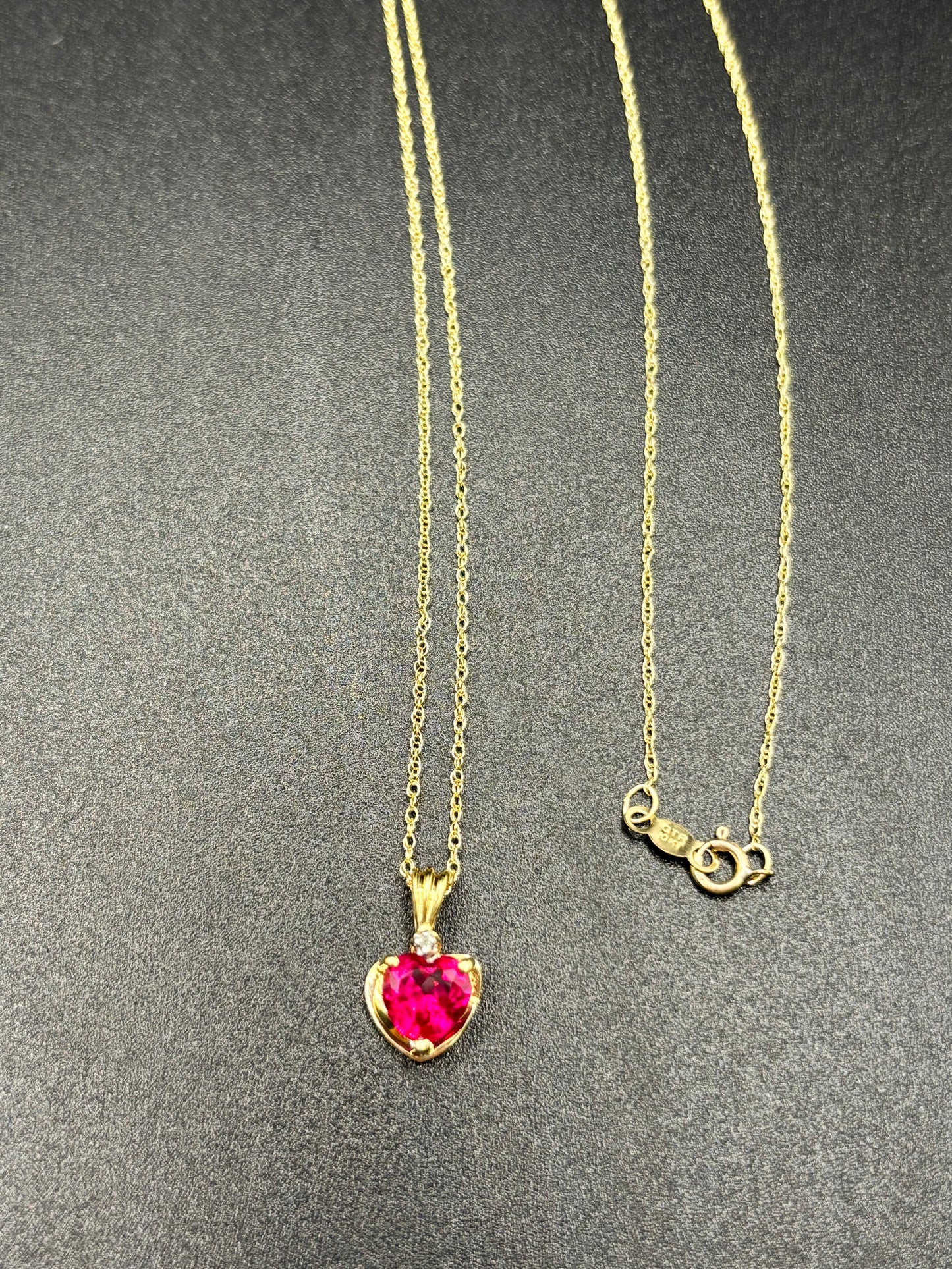 18” 10k yellow gold chain & heart pendant with diamond accent & synthetic ruby