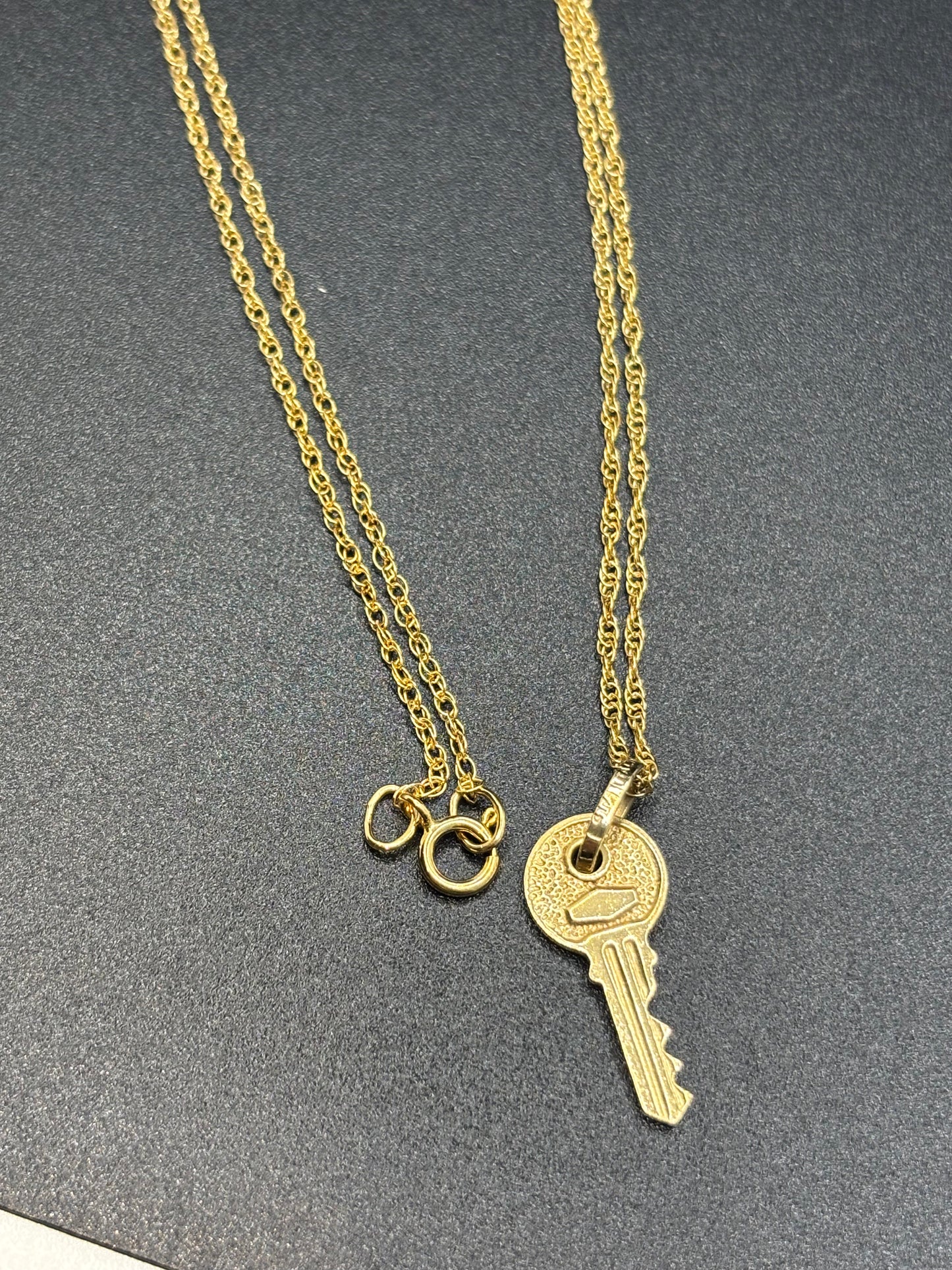 10k gold 18” rope chain with 10k gold key pendant