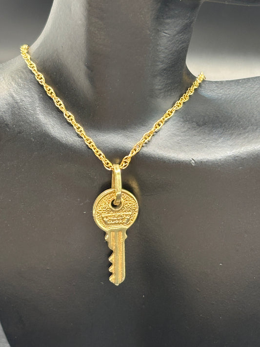 10k gold 18” rope chain with 10k gold key pendant
