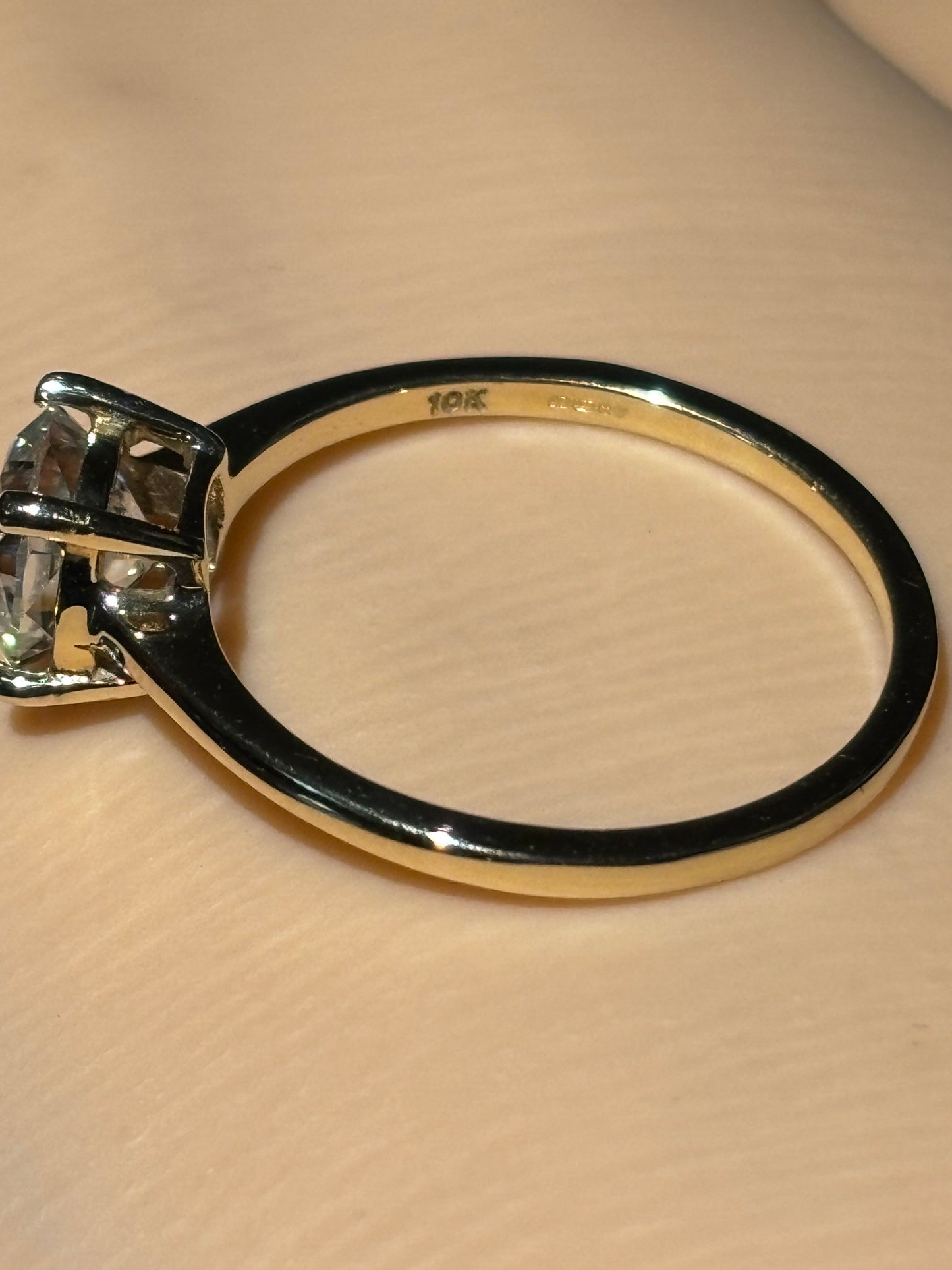 10k yellow gold ring with a 1 carat cushion cut Moissanite, size 7