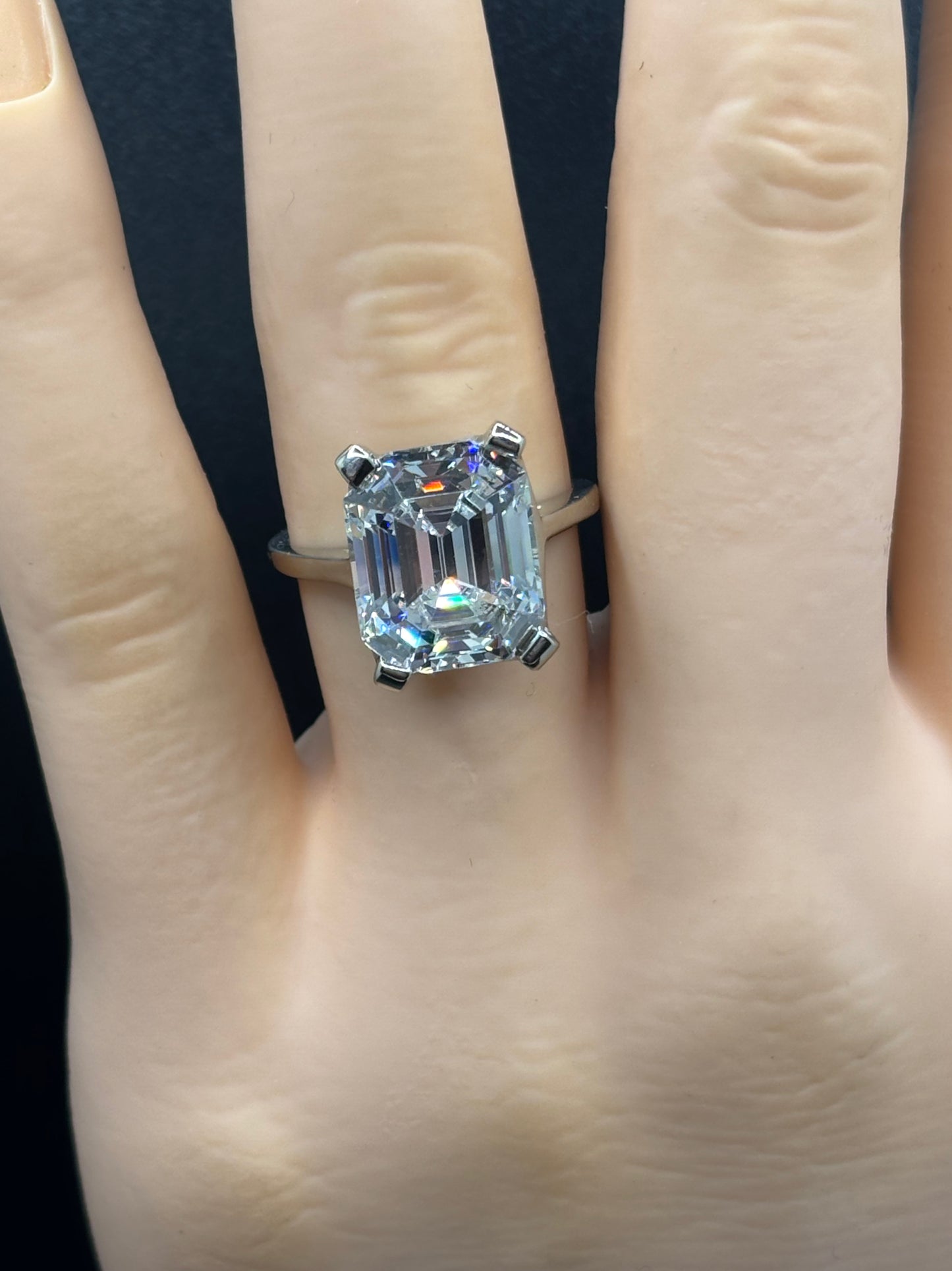 10k white gold ring with an 8ct emerald cut Moissanite, size 6.5