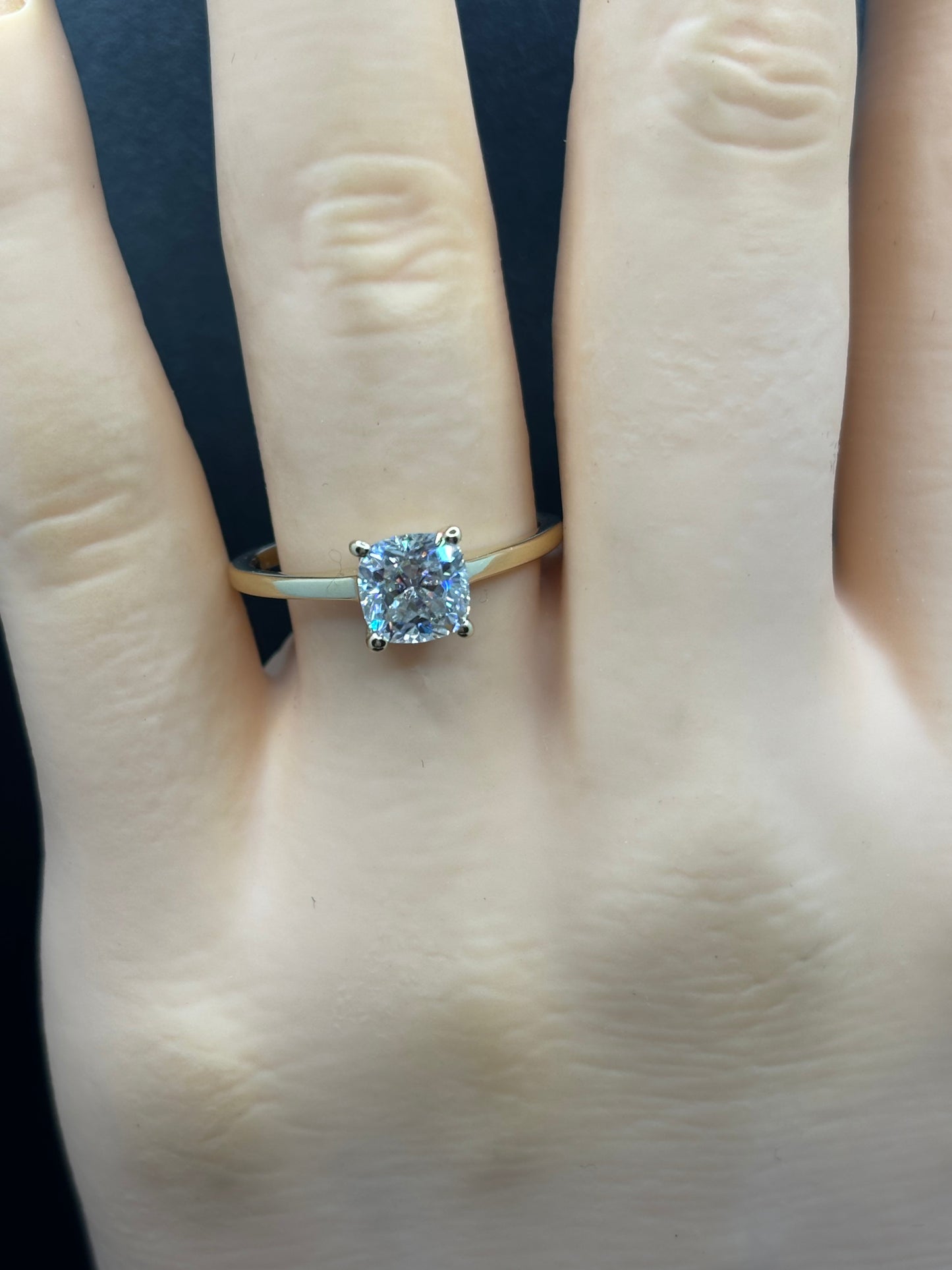 10k yellow gold ring with a 1 carat cushion cut Moissanite, size 7