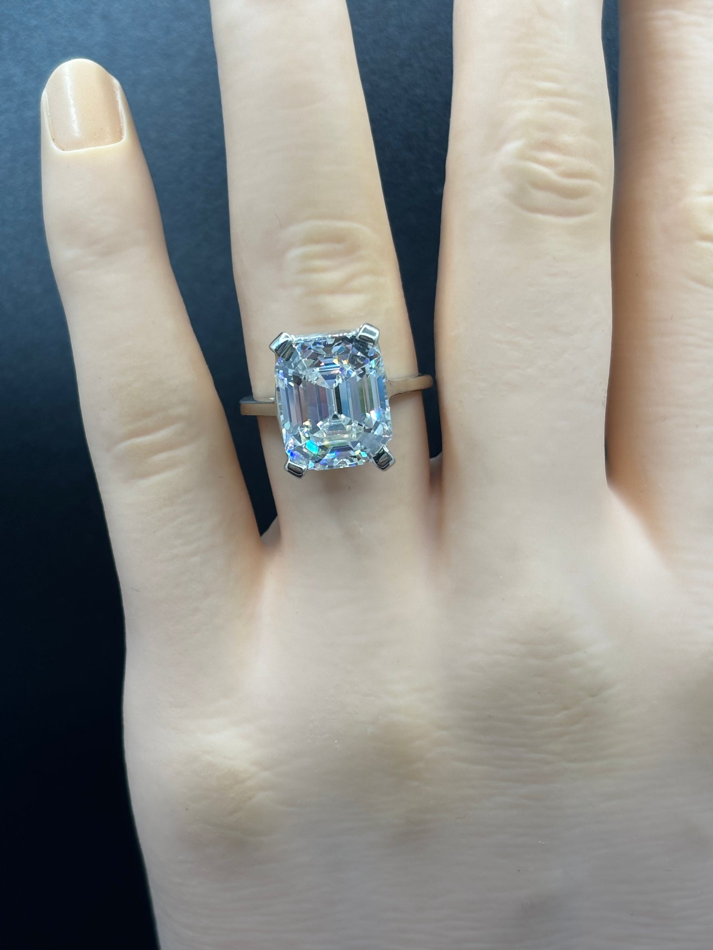 10k white gold ring with an 8ct emerald cut Moissanite, size 6.5